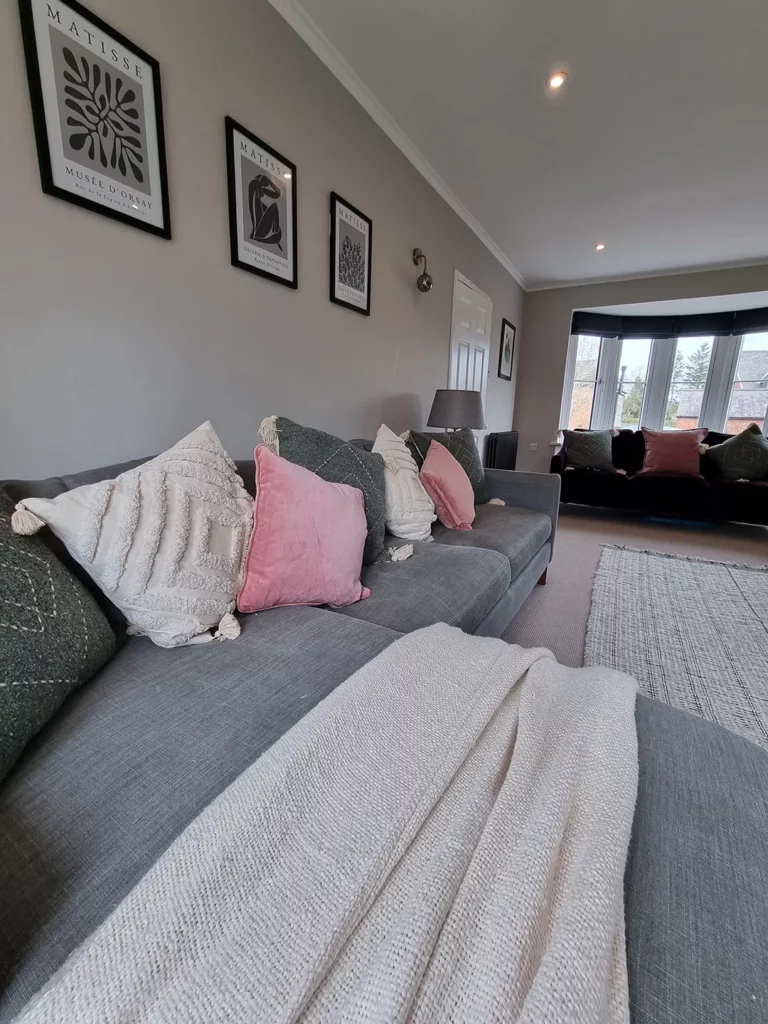 View of living room showing sofas